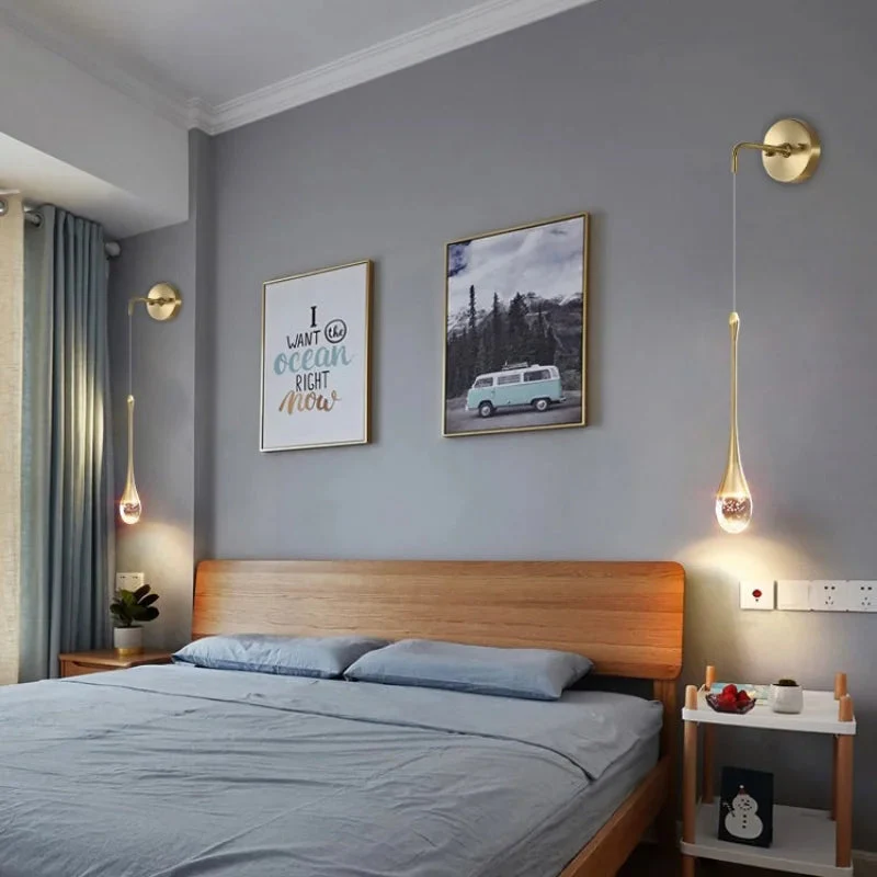 Modern LED Wall Light with Teardrop Glass Pendant and Gold Accent �C Warm Ambient Glow