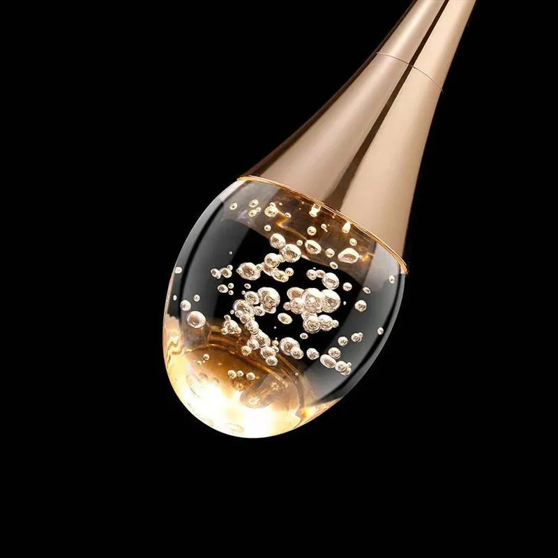 Modern LED Wall Light with Teardrop Glass Pendant and Gold Accent �C Warm Ambient Glow
