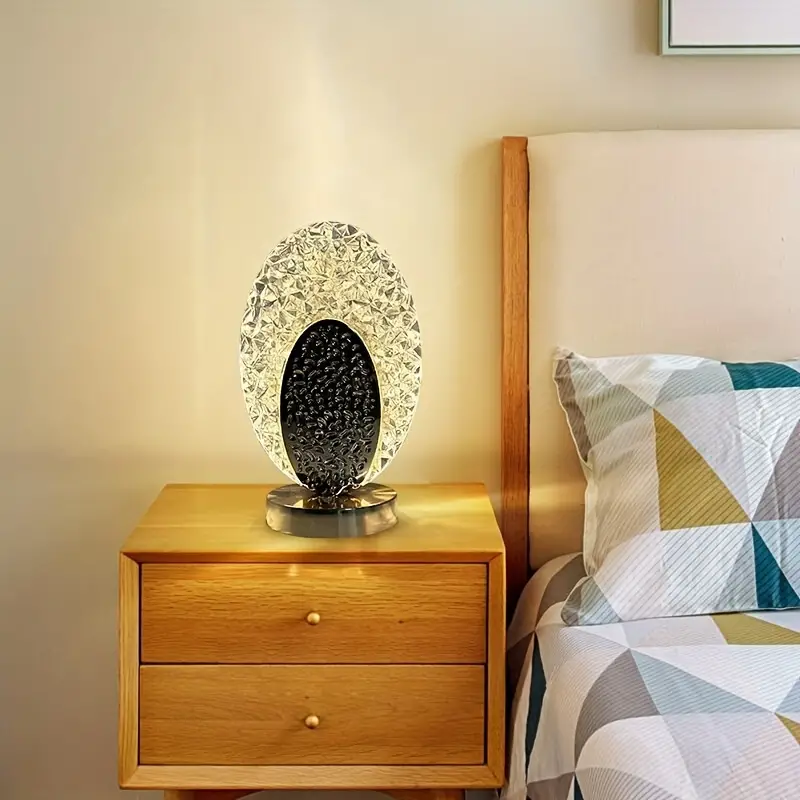 Modern Elegant Peacock-Inspired Table Lamp with Textured Oval Design