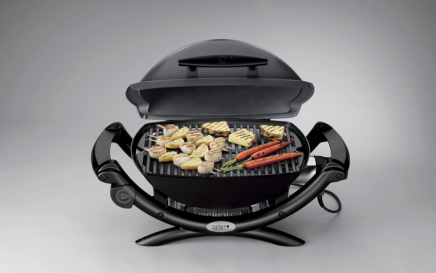 Weber Q1400 Barbecue électrique, surface de cuisson 43 x 32 cm, nomade, grille en fonte émaillée divisée en 2 parties, couvercle et cuve en fonte d'aluminium - Gris foncé (52020053)